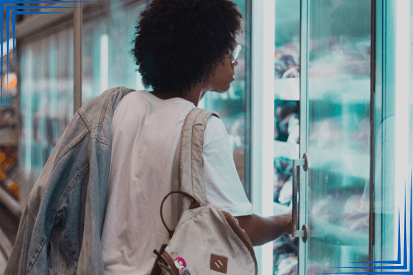 woman using commercial refrigerations system